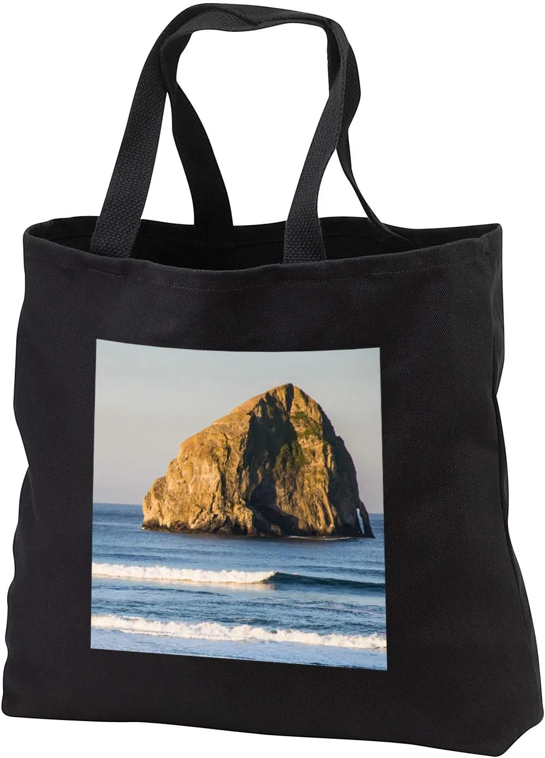 3dRose Oregon. Sunrise on the beach, Haystack Rock in Pacific Ocean. - Tote Bags (tb_346784)